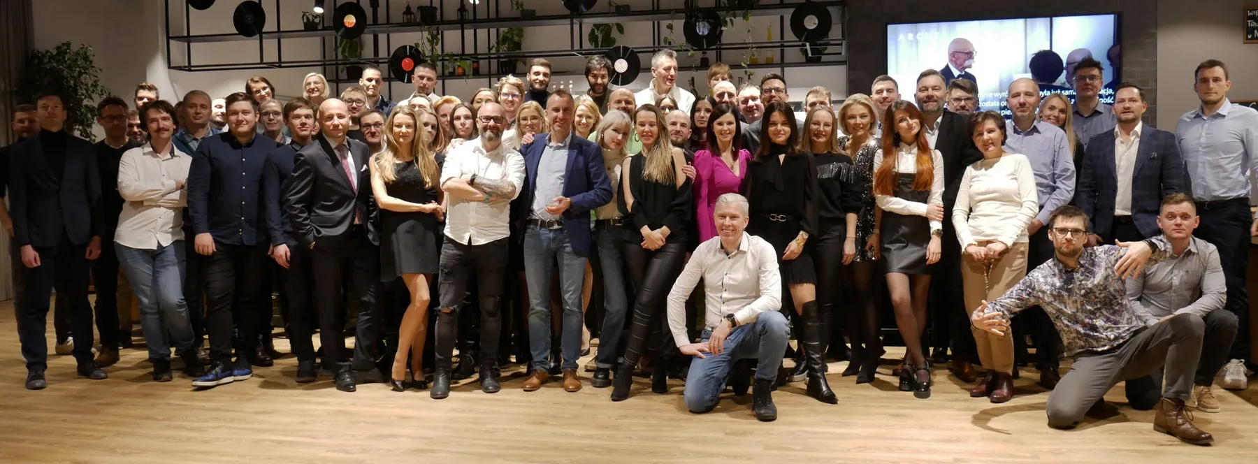 The Astrafox team: dozens of employees in a group photo at the company's office